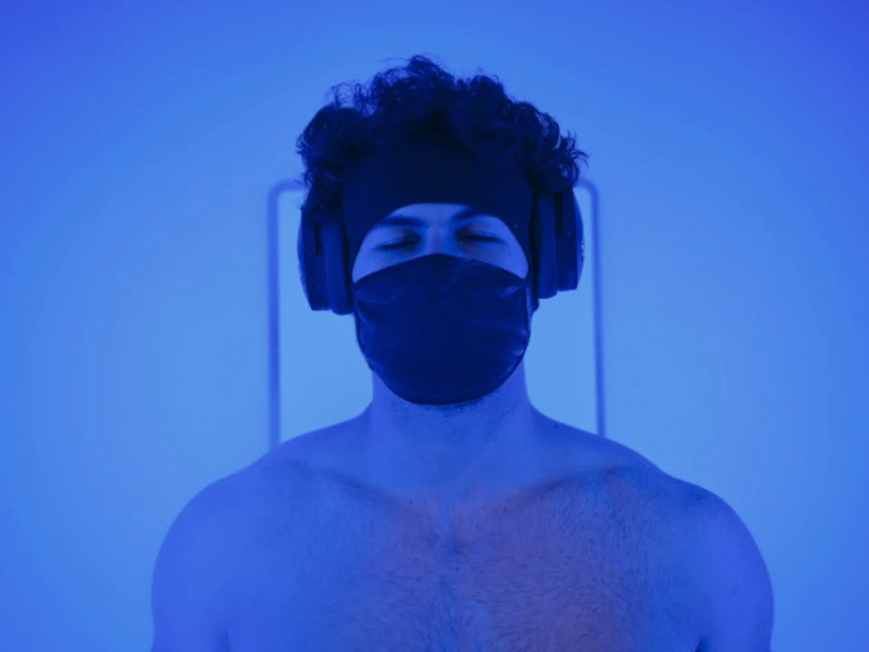 Man in a cryotherapy chamber in biohacking lab